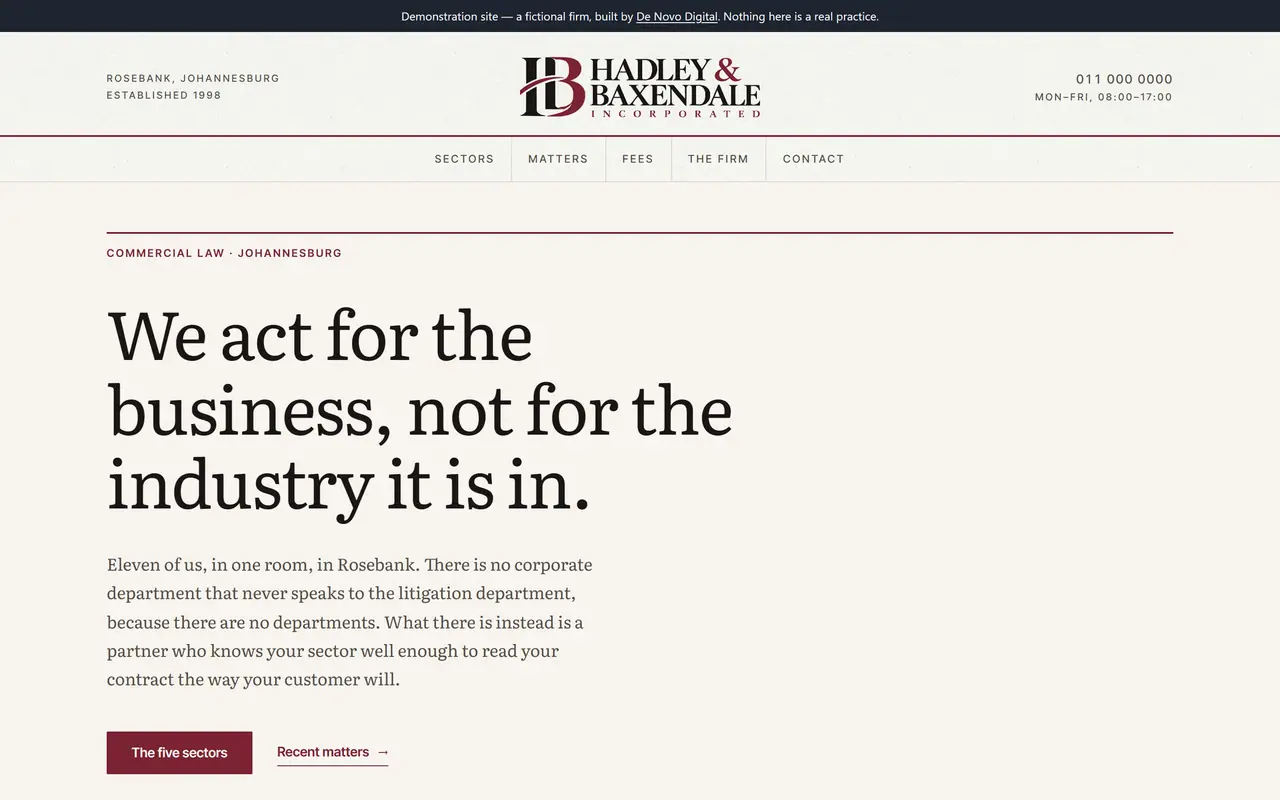 The Hadley & Baxendale Inc website on a laptop.